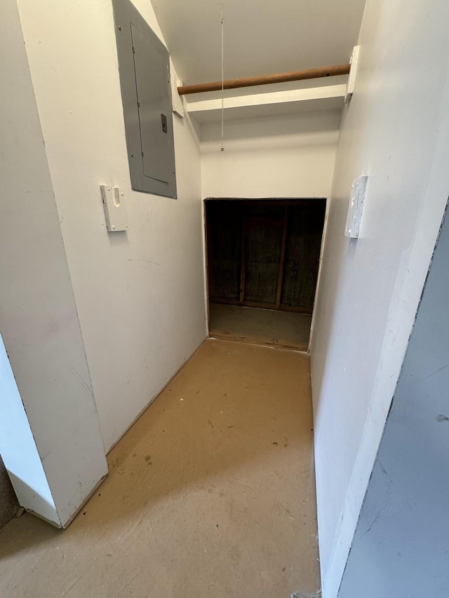 interior space with electric panel and a fireplace