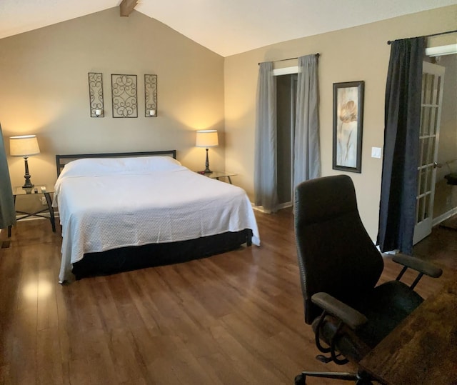 bedroom featuring dark wood-type flooring and lofted ceiling with beams