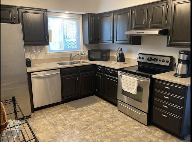 kitchen featuring appliances with stainless steel finishes and sink