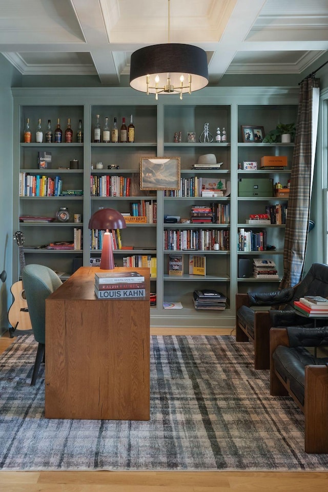 living area featuring wood-type flooring, beam ceiling, and coffered ceiling