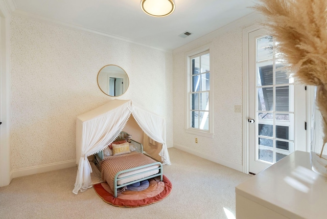 living area featuring crown molding and light colored carpet