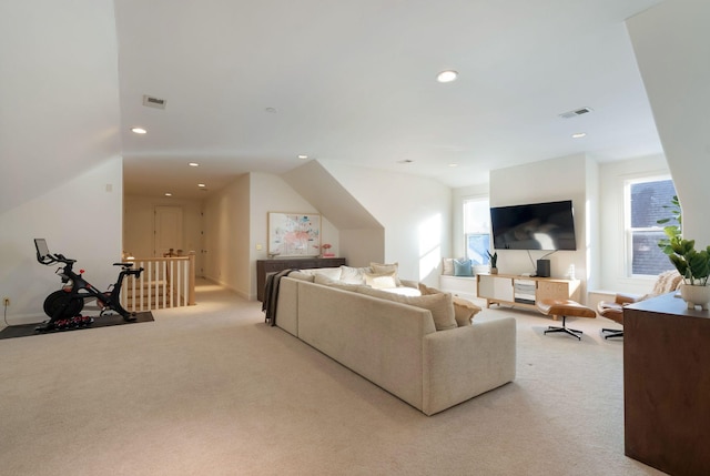 living room featuring light carpet