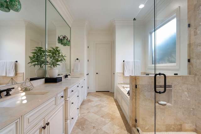 bathroom featuring vanity, ornamental molding, and separate shower and tub