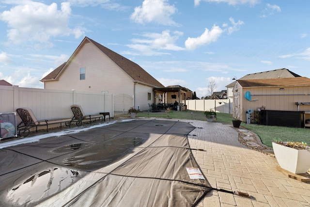 view of swimming pool with a patio