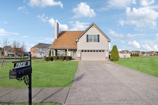 front facade featuring a garage and a front lawn