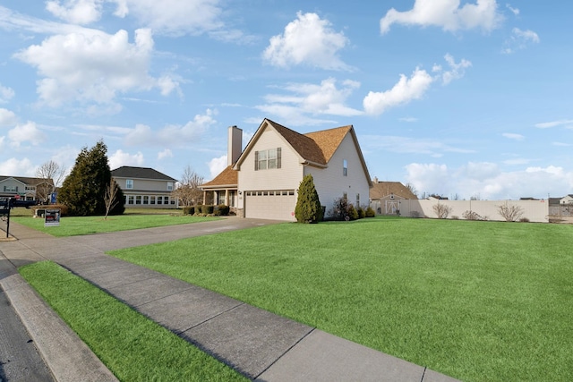 view of home's exterior featuring a garage and a lawn