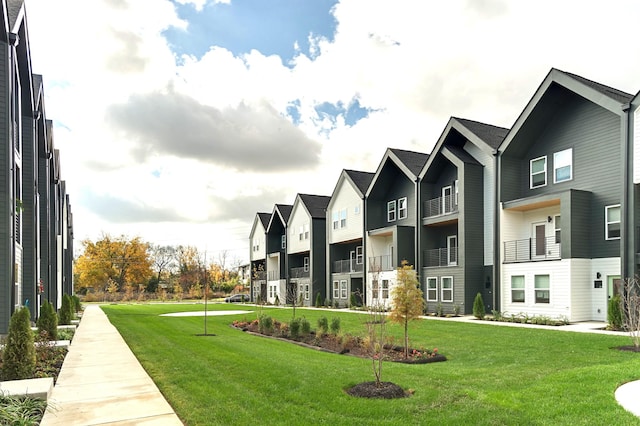 view of community featuring a yard