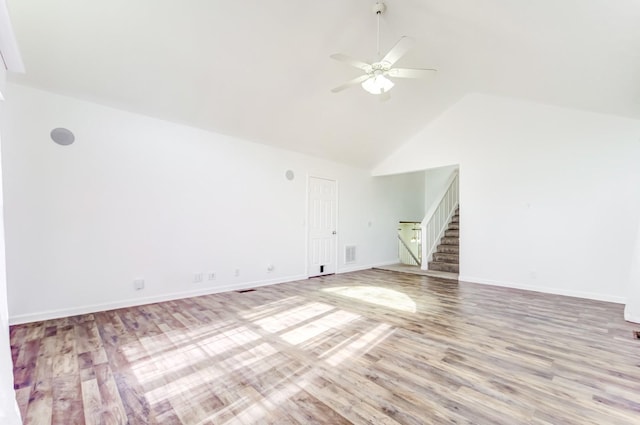 unfurnished living room featuring ceiling fan, high vaulted ceiling, and light hardwood / wood-style floors