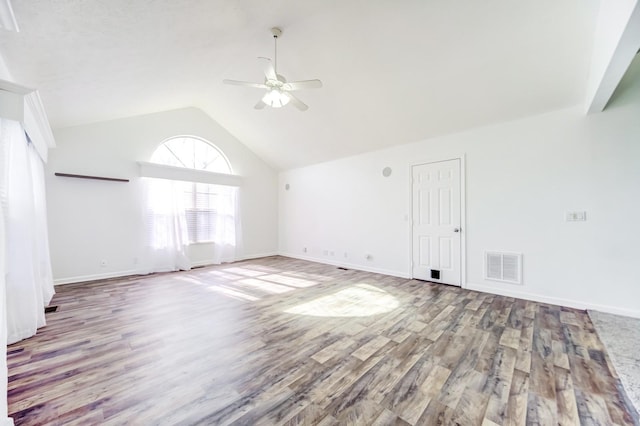 interior space featuring lofted ceiling, ceiling fan, and light hardwood / wood-style flooring