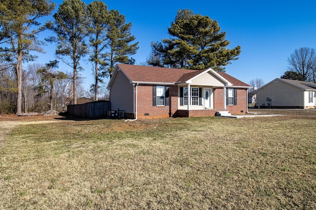 view of front facade featuring cooling unit, covered porch, and a front lawn