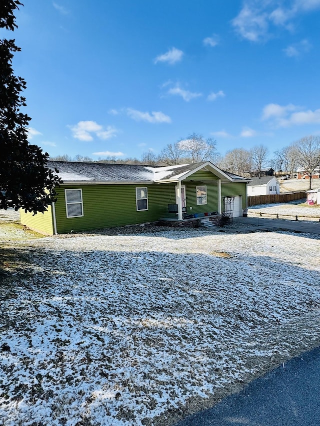 ranch-style house featuring a garage