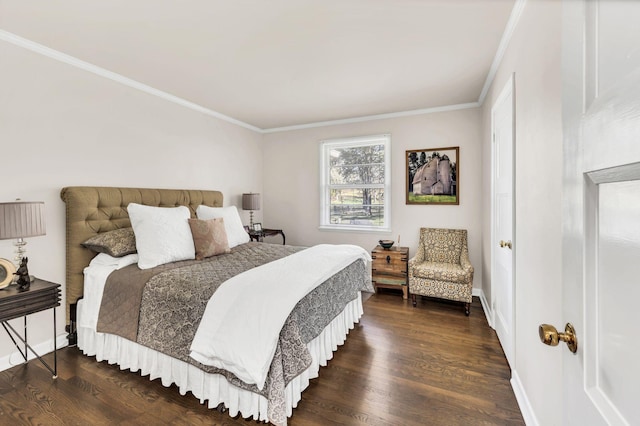 bedroom featuring dark hardwood / wood-style flooring and ornamental molding