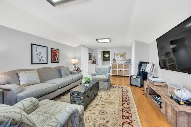 living room with light hardwood / wood-style floors