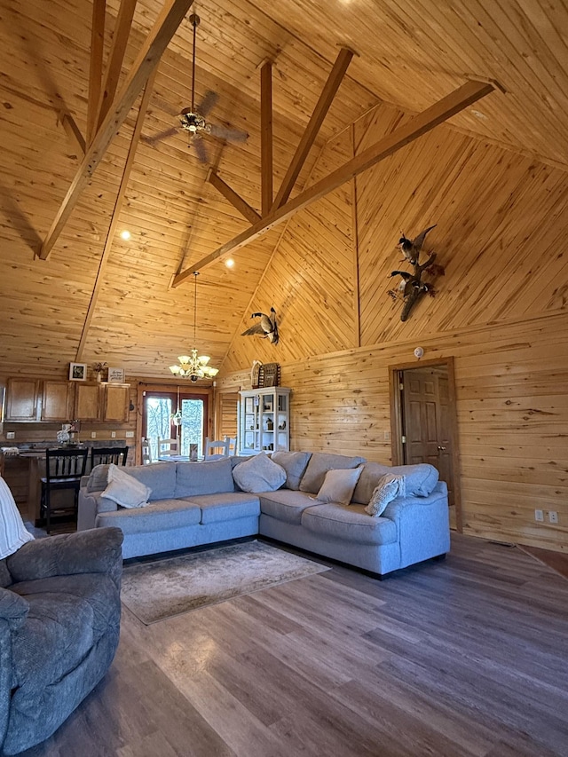 living room featuring high vaulted ceiling, wooden ceiling, hardwood / wood-style flooring, and beamed ceiling