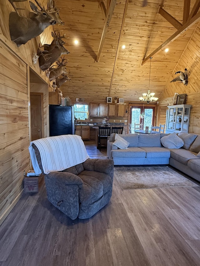 living room with wooden ceiling, beam ceiling, and wooden walls