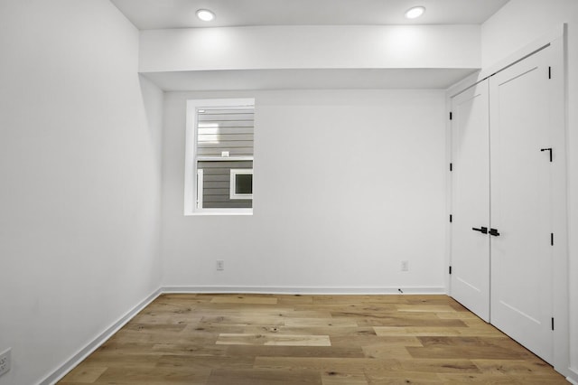 empty room featuring light hardwood / wood-style floors