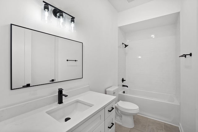 full bathroom with tile patterned flooring, vanity, shower / bathtub combination, and toilet