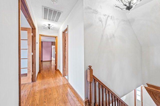 hallway featuring light hardwood / wood-style floors