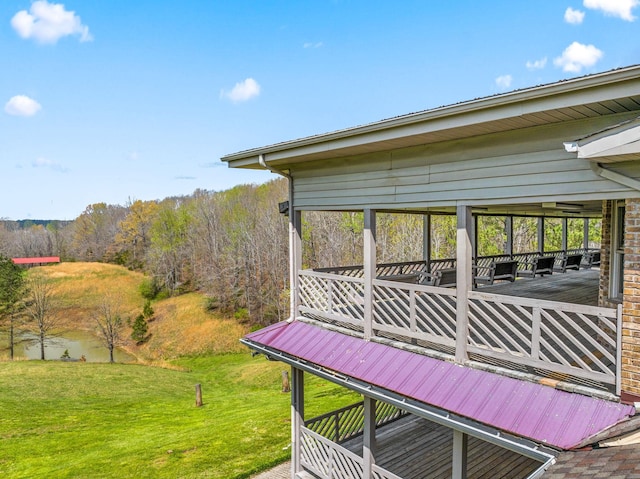 deck featuring a yard