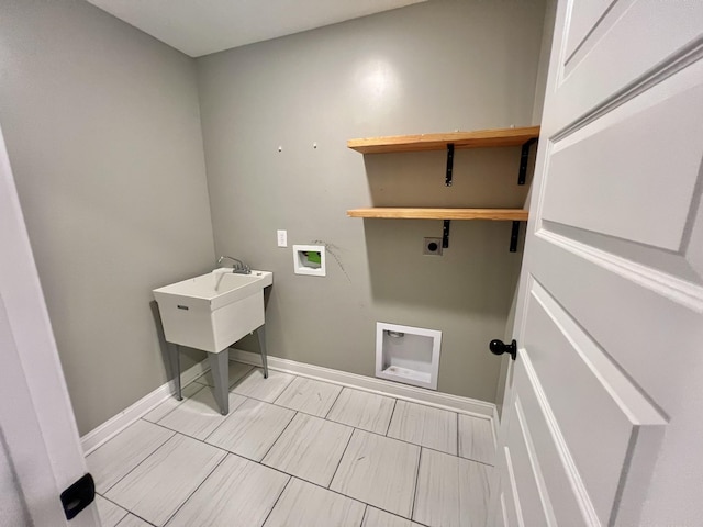 washroom featuring baseboards, laundry area, hookup for a washing machine, and hookup for an electric dryer