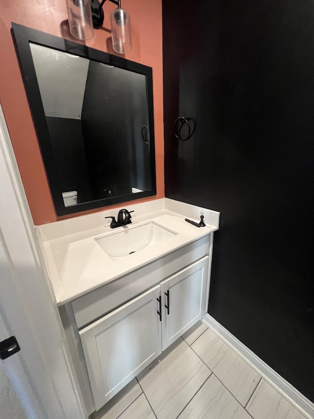 bathroom featuring tile patterned floors and vanity