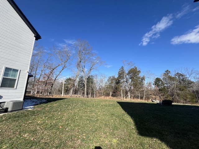 view of yard featuring central AC unit