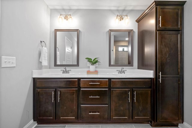 bathroom featuring vanity and tile patterned flooring