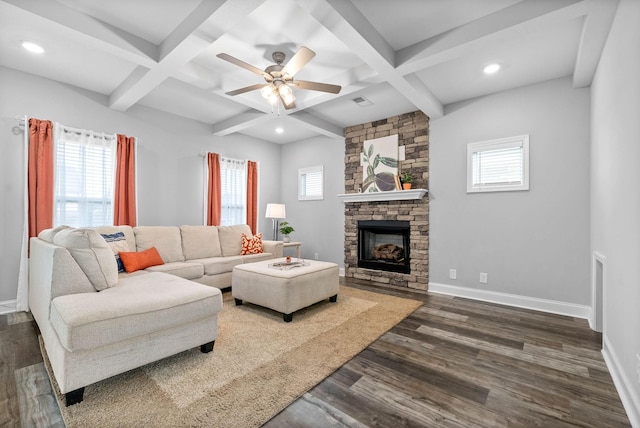 living room with dark wood-type flooring, beam ceiling, and coffered ceiling