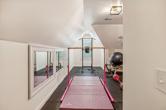 workout area with lofted ceiling