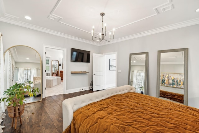 bedroom featuring ensuite bathroom, dark hardwood / wood-style floors, ornamental molding, and a notable chandelier