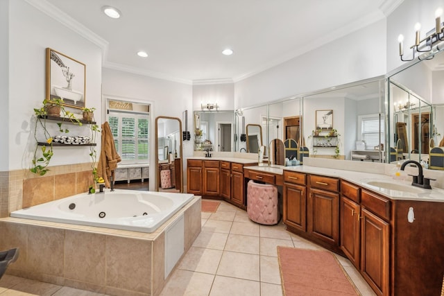 bathroom with a relaxing tiled tub, tile patterned floors, vanity, and crown molding