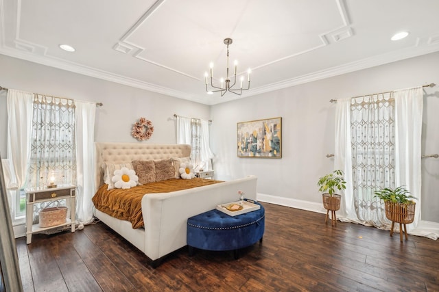 bedroom featuring dark wood-type flooring, an inviting chandelier, and ornamental molding