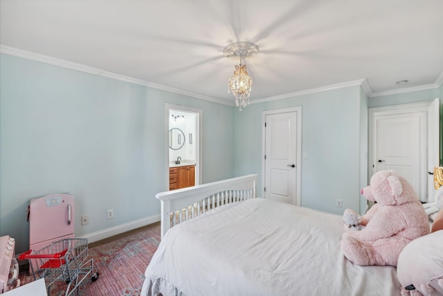 bedroom featuring an inviting chandelier, hardwood / wood-style floors, ensuite bath, ornamental molding, and sink