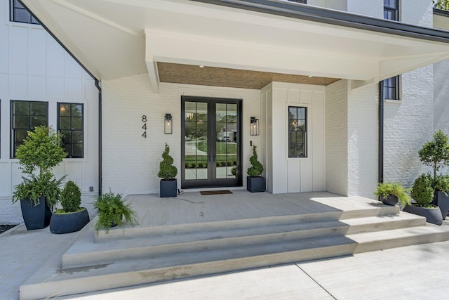 doorway to property featuring french doors