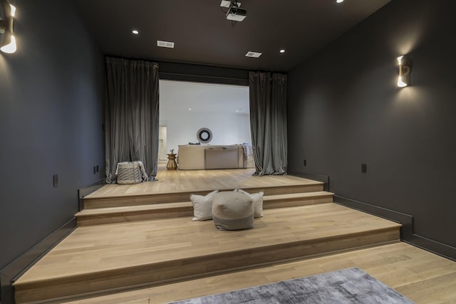 home theater featuring light hardwood / wood-style floors