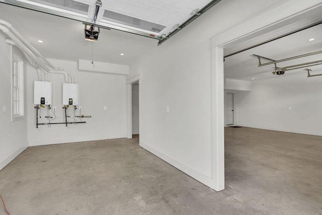 garage with water heater and a garage door opener