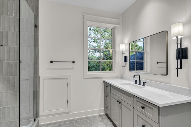 bathroom featuring tile patterned floors, walk in shower, and vanity