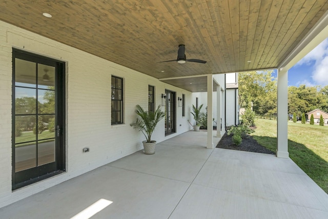 view of patio featuring ceiling fan