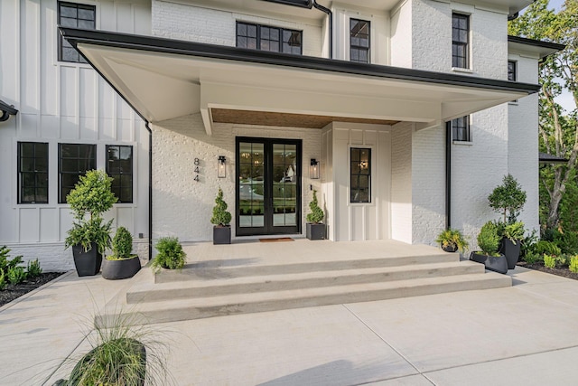 entrance to property featuring french doors