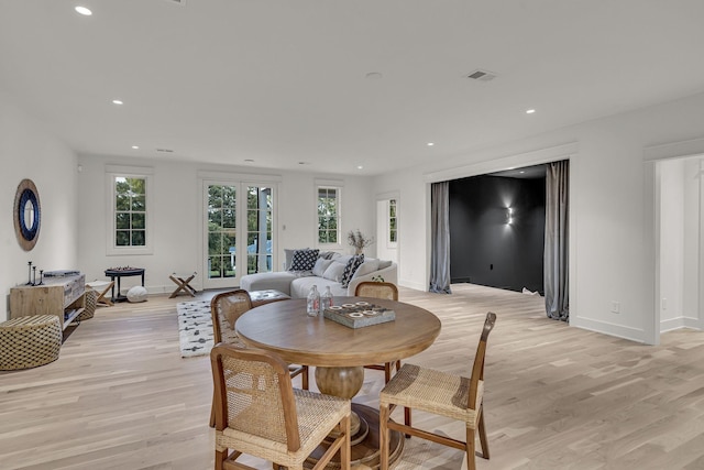 dining room with light hardwood / wood-style flooring