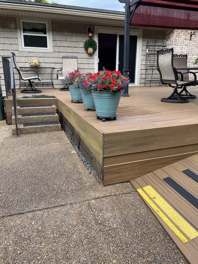 wooden terrace with a porch