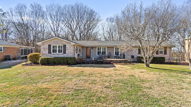 ranch-style house with a front lawn