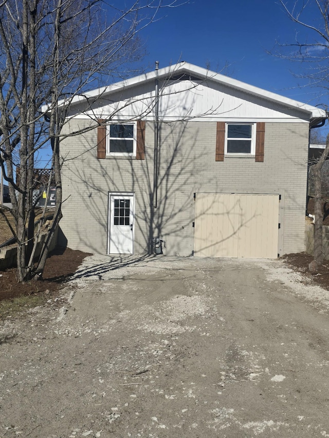 view of property exterior with a garage