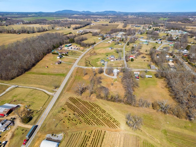 birds eye view of property featuring a rural view