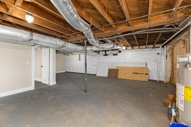 unfinished basement with water heater and baseboards