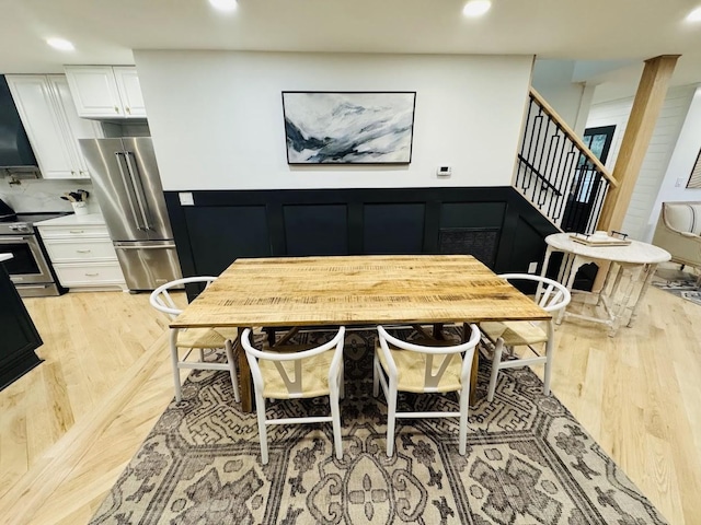 dining area with light wood-type flooring