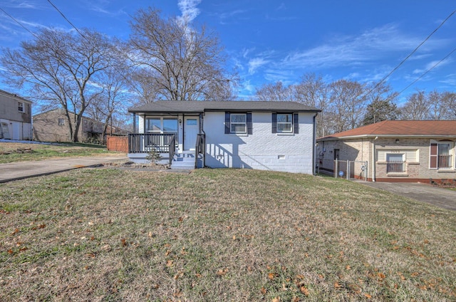 view of front facade with covered porch and a front yard