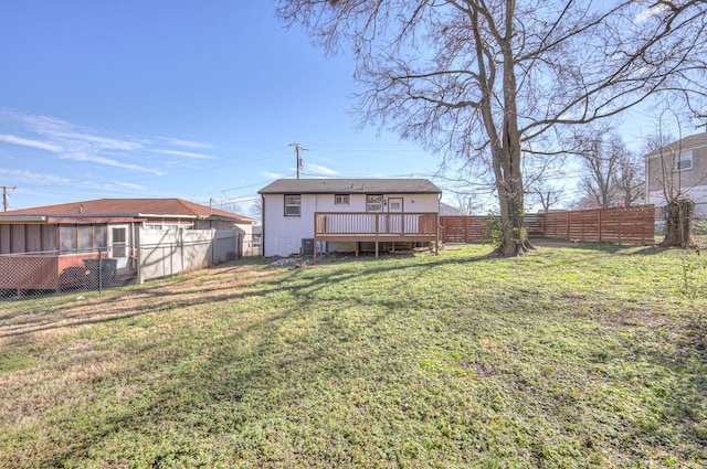 view of yard featuring a deck