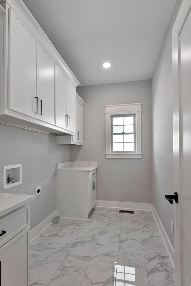 3025 Shady Forest Dr, Murfreesboro, TN 37128 - washroom featuring hookup for an electric dryer, recessed lighting, cabinet space, baseboards, and washer hookup