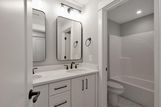 3025 Shady Forest Dr, Murfreesboro, TN 37128 - bathroom featuring a sink, washtub / shower combination, marble finish floor, double vanity, and toilet